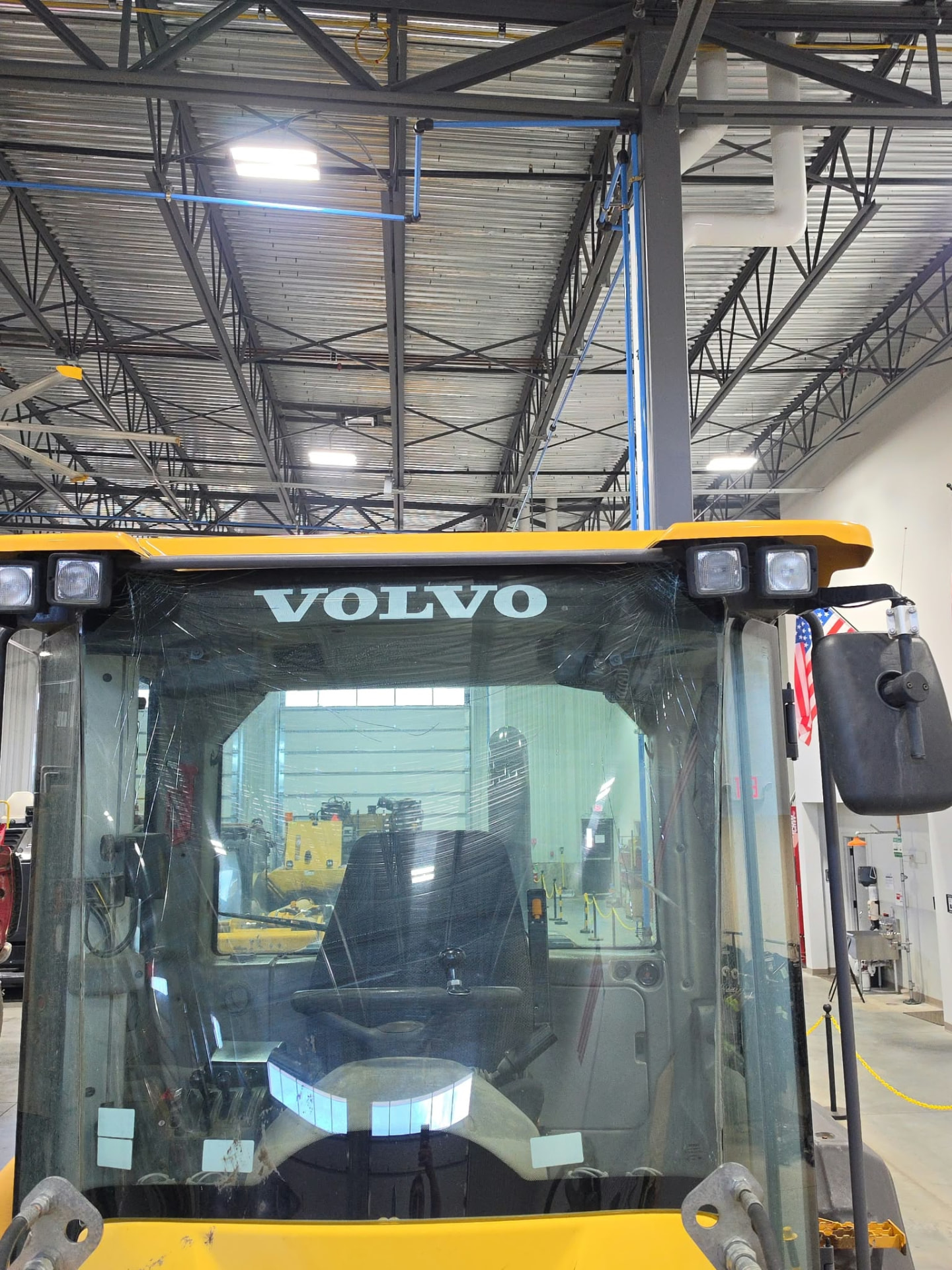 Close view of Volvo construction equipment cab glass